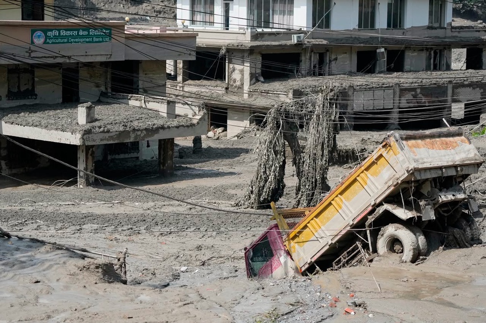 Almost 400 travellers are missing following the flash flood (Niranjan Shrestha/AP) (AP)
