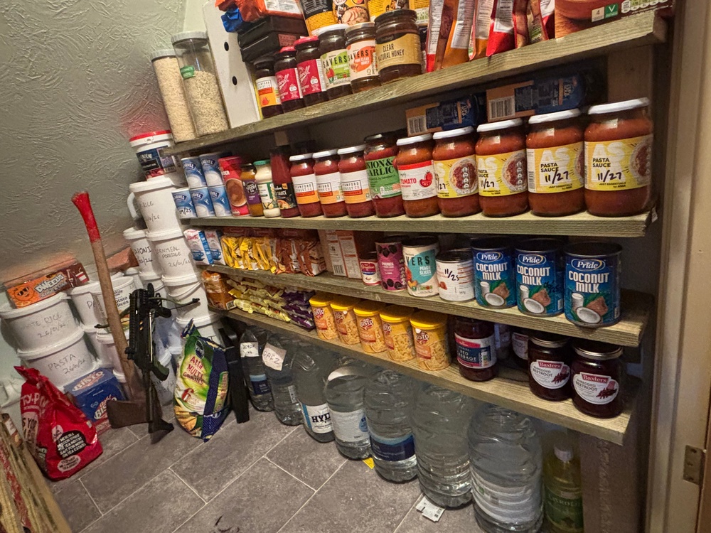 Mike's pantry includes bottled jars and tins of food which he labels with use-by-dates as part of a regular six-monthly audit (Mike UK Urban Prepper)