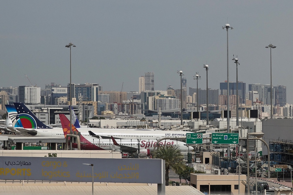 Planes parked at Dubai International Airport on March 11, 2026 after drones fell near the airport, injuring four people (AFP via Getty Images)