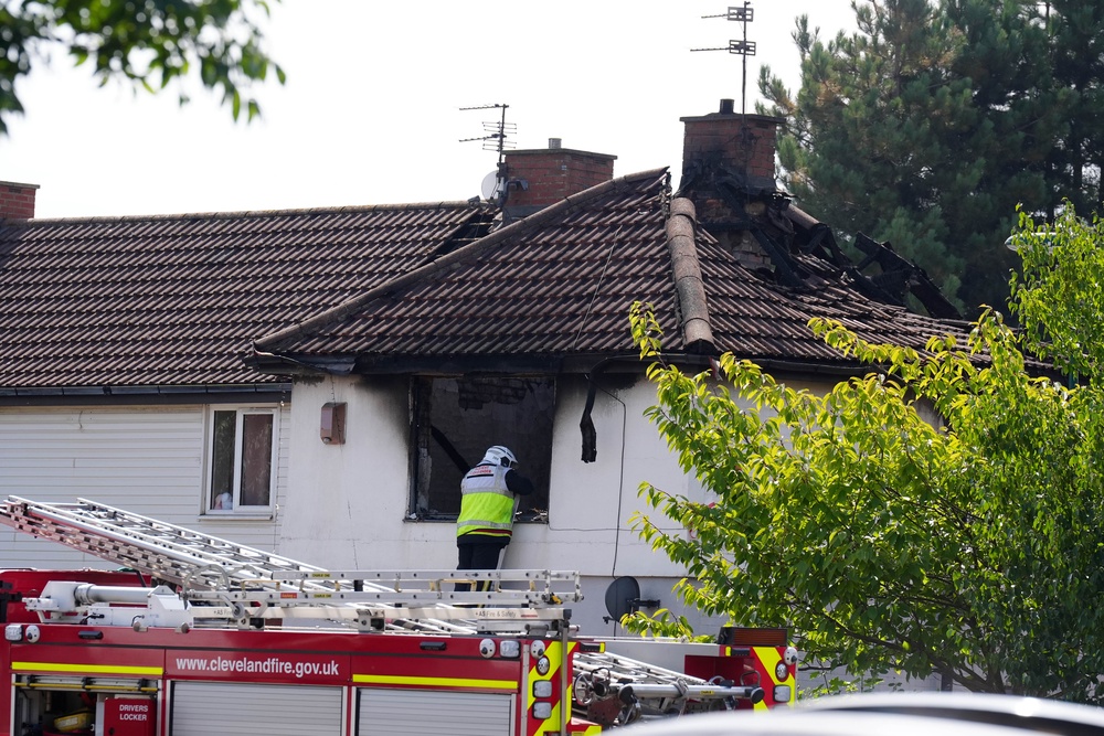 Officers were called to the property at 5:23am on Wednesday (PA)