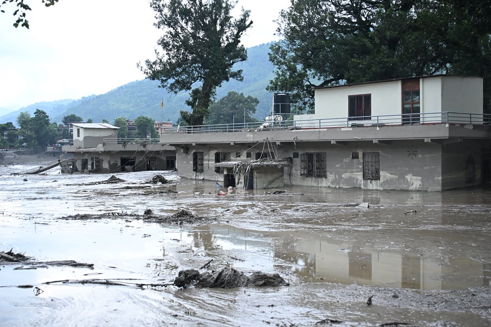 At least 95 people have been killed in flash floods that have hit the border between China and Nepal, Reuters has reported on Wednesday citing police (AFP/Getty)