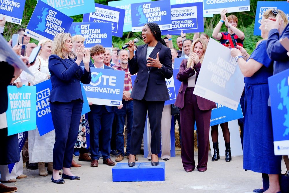 Penny Mordaunt (left) wants to return to the party, but insiders say Badenoch is blocking her return (PA)