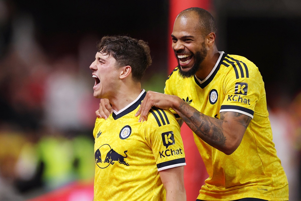 Daniel James of Leeds United celebrates scoring his team’s second goal with teammate Lukas Nmecha (Getty)