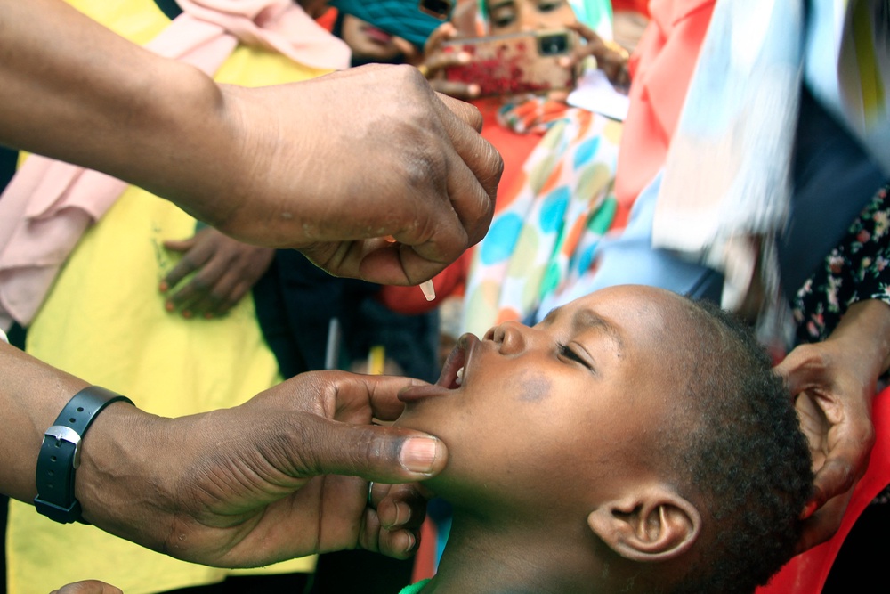 A child is given drops during a UNICEF campaign responding to a polio epidemic in Sudan (AFP/Getty)