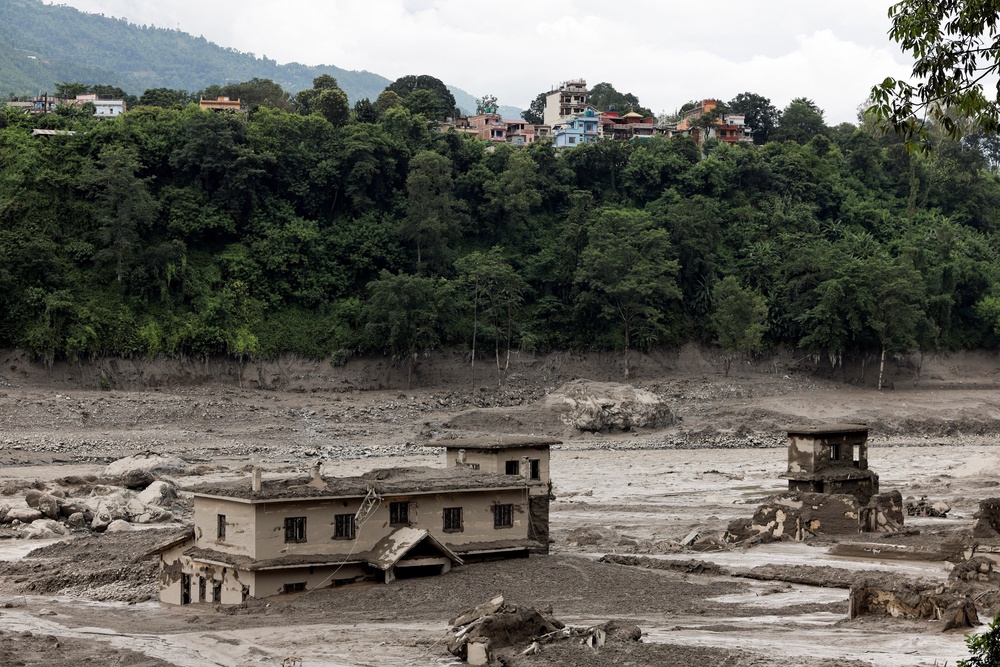 Buildings were submerged in a sea of mud in Nepal (Reuters)
