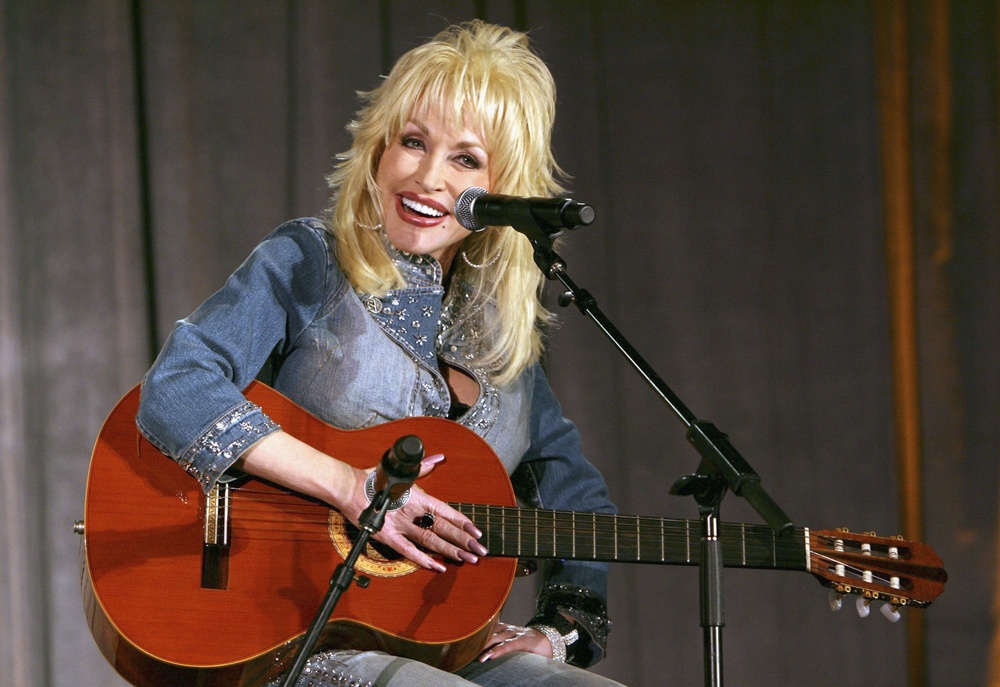 Dolly Parton, who has died at 80, used her power to inspire women to be unapologetically glam through her unforgettable style (Getty Images)