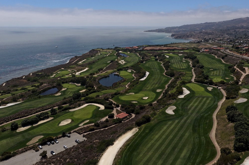 When Taele was arrested earlier this month, he was seen wearing an earpiece and taking pictures of the golf course where Trump was scheduled to attend a Republican National Committee dinner. (Justin Sullivan/Getty Images)