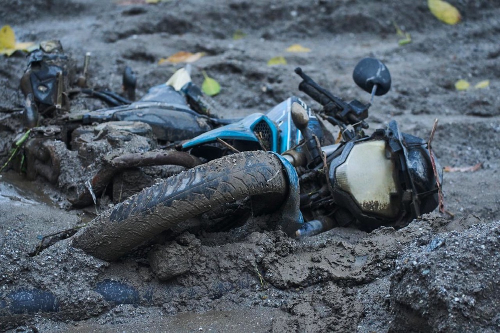 A two-wheeler lies in the aftermath of flash floods in Devighat in the Nuwakot district in Nepal, Thursday, 27 August 2026 (AP)