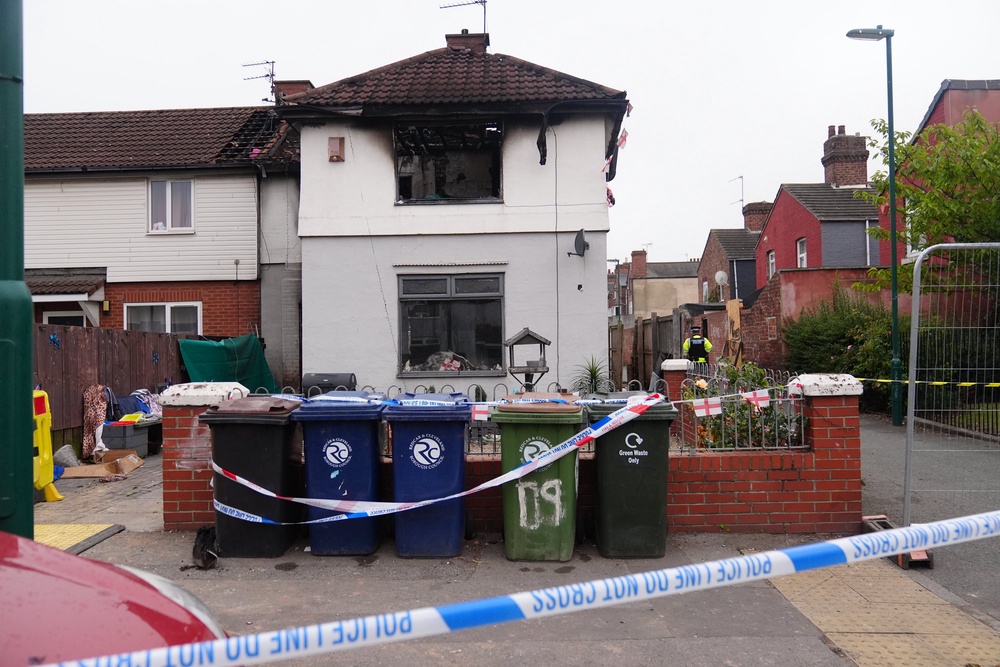 The fire killed a 34-year-old woman and a seven-year-old girl on Wednesday morning (PA)