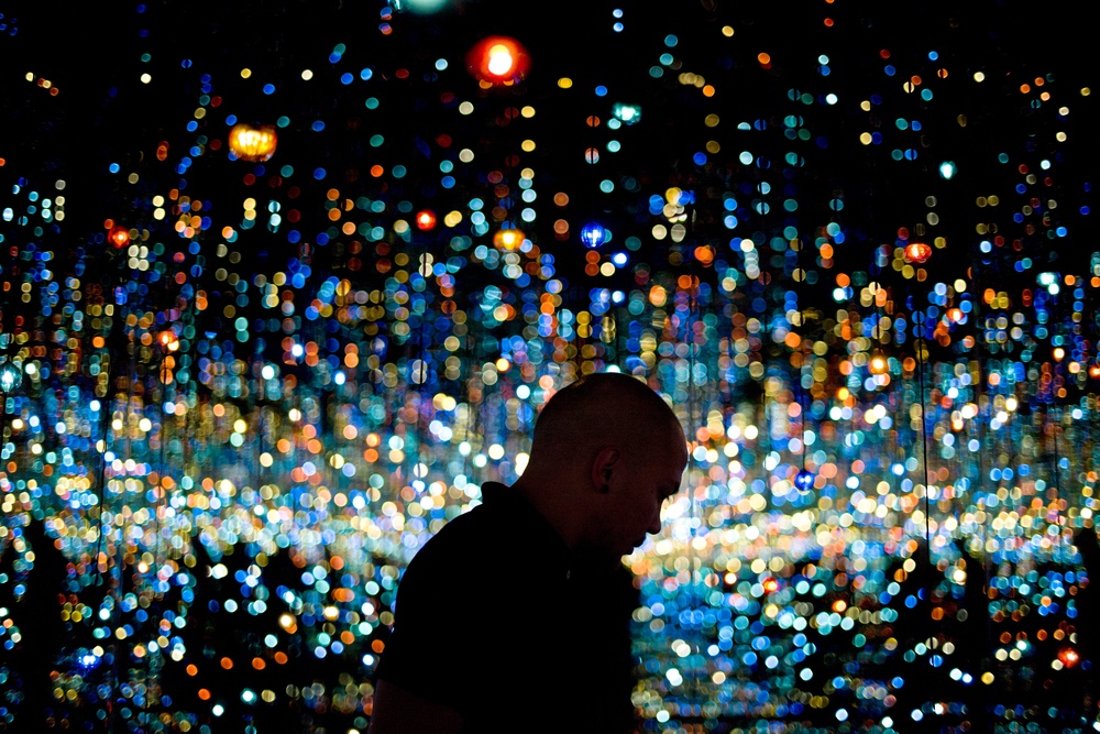 A man views Yayoi Kusama’s Infinity Mirrored Room at the Broad museum in Los Angeles (Jae C Hong/AP) (AP)