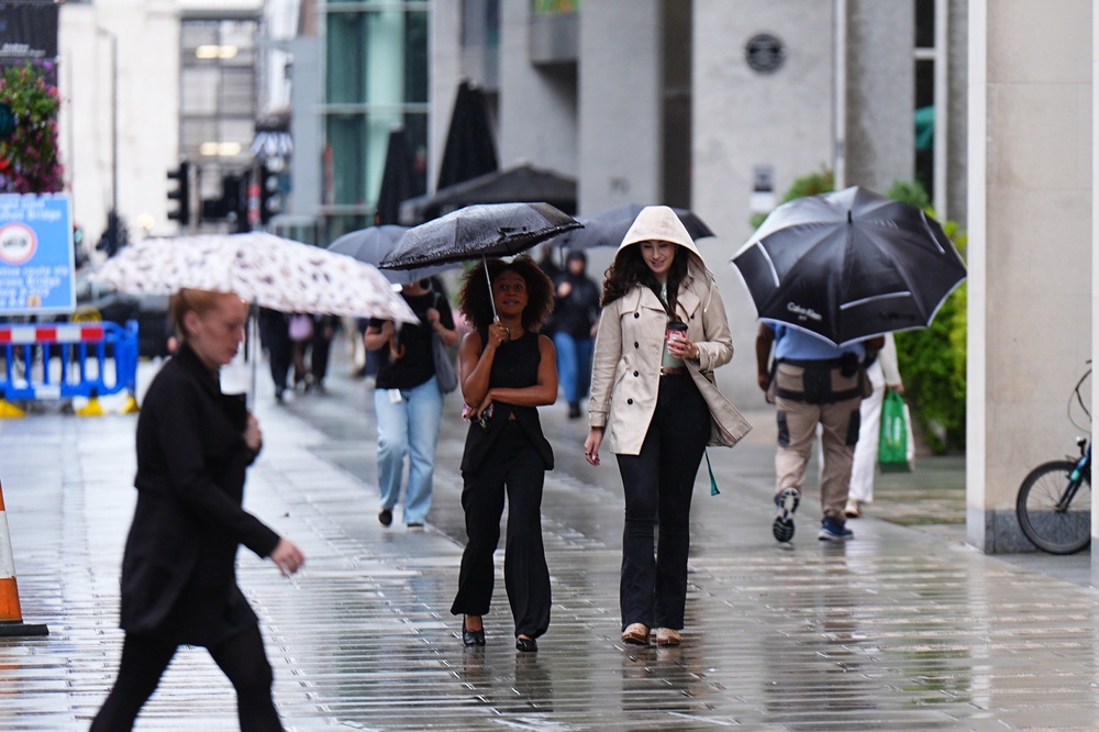 Heavy rain is forecast across the country (PA)