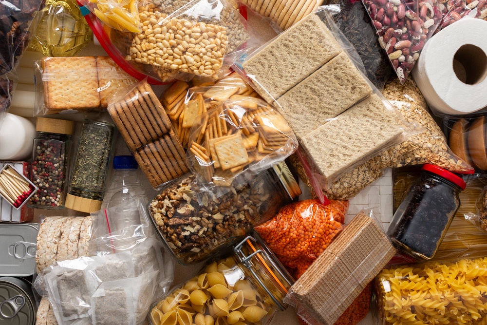 Crackers, nuts, herbs and a few favourite snacks add calories, variety and a little morale when meals start to repeat (Getty/iStock)