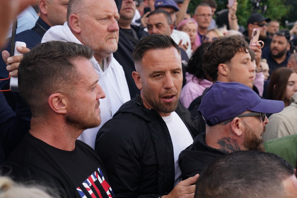 Daniel Thomas with Tommy Robinson (PA)