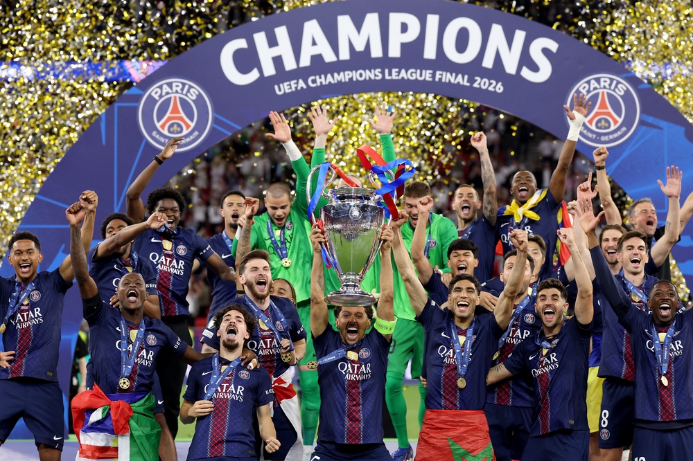 Marquinhos of Paris Saint-Germain lifts the UEFA Champions League trophy (Getty)