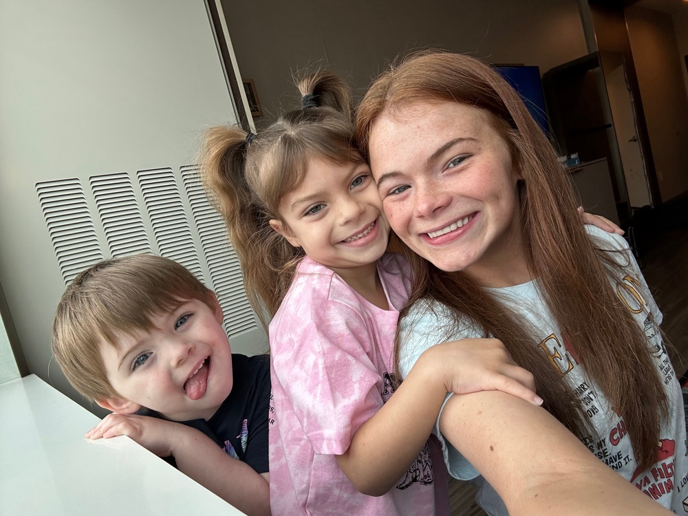 Griffin, pictured during the throes of postpartum psychosis last year with stepdaughter Ava, 6, and Thomas, 4. She said her symptoms included hearing voices and hallucinations that made her ‘lose touch with reality’ (Stormi Griffin)