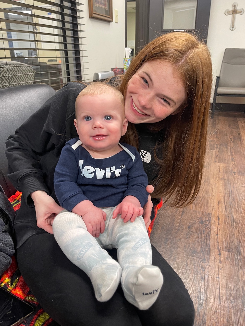 Stormi Griffin with her baby boy, Ethan, during an onset of postpartum psychosis. Griffin shared the photos on TikTok in light of Lindsay Clancy’s murder trial to show how mothers going through the rare condition might appear ‘normal’ from the outside (Stormi Griffin)