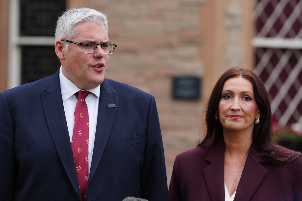 DUP leader Gavin Robinson and deputy First Minister Emma Little-Pengelly, speak to the ahead of a meeting with Prime Minister Andy Burnham Brian Lawless/PA) (PA Wire)