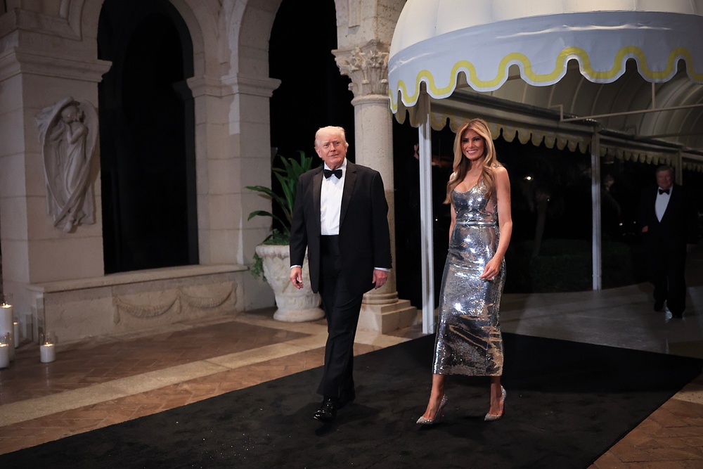 Michael Dorrell, an Australian billionaire, owns a home near Mar-a-Lago, the president’s Florida estate, and has bragged about mingling with the Republican’s inner circle, according to the report. Pictured: Donald Trump and first lady Melania Trump arrive for a New Year’s Eve event at Mar-a-Lago on December 31, 2025 (Getty Images)
