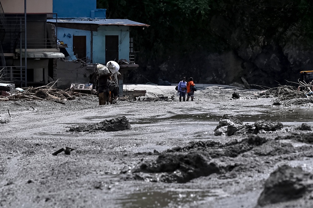 Rescue efforts continue after flooding in the Rasuwa district of Nepal (AFP/Getty)