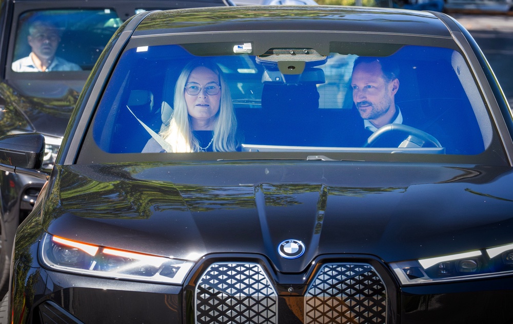 Haakon and Mette-Marit leave the hospital after visiting King Harald (AP)