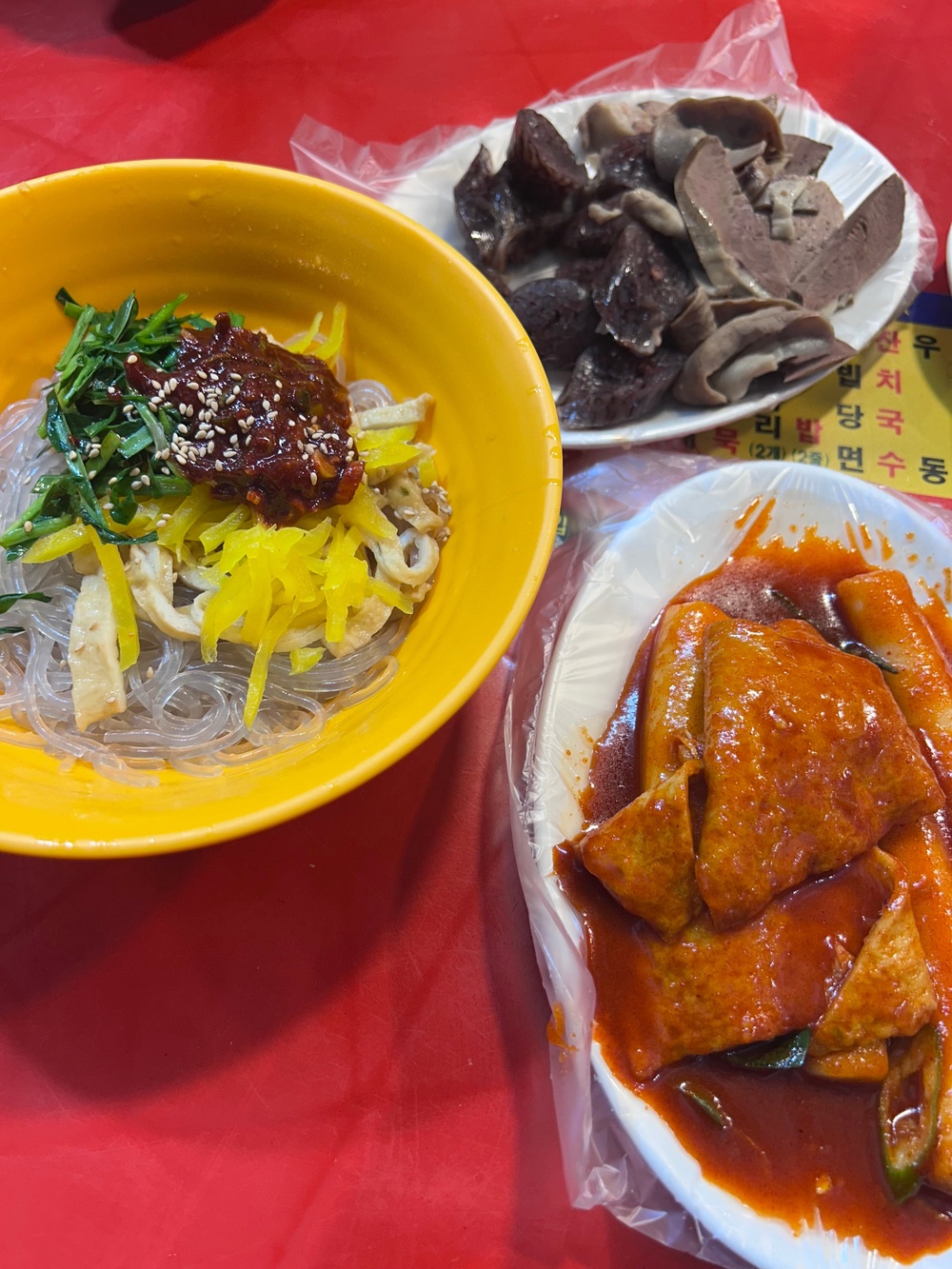 Hayley tucks into a trio of colourful dishes at Jagalchi Market (Hayley Spencer)