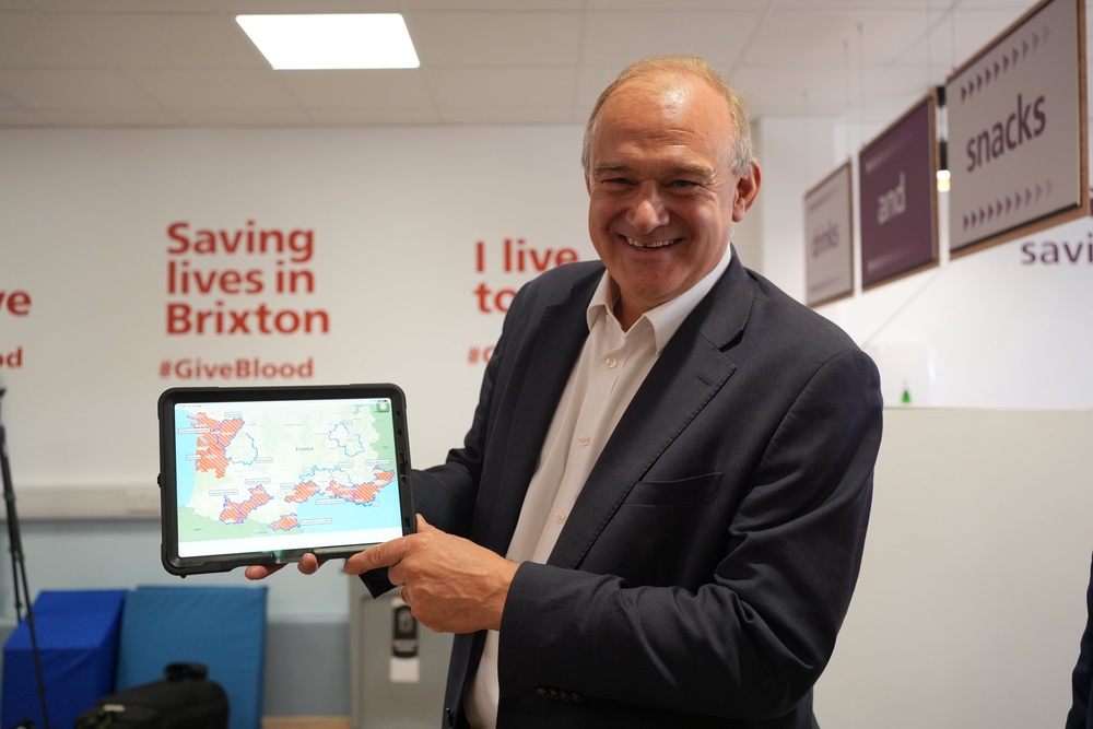 Sir Ed Davey shows the areas on a map with restrictions after he could not give blood (Yui Mok/PA) (PA Wire)