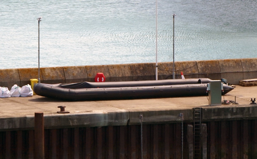 A boat used by people thought to be migrants on the quayside at the Border Security Command compound in Dover, Kent (Gareth Fuller/PA) (PA Wire)