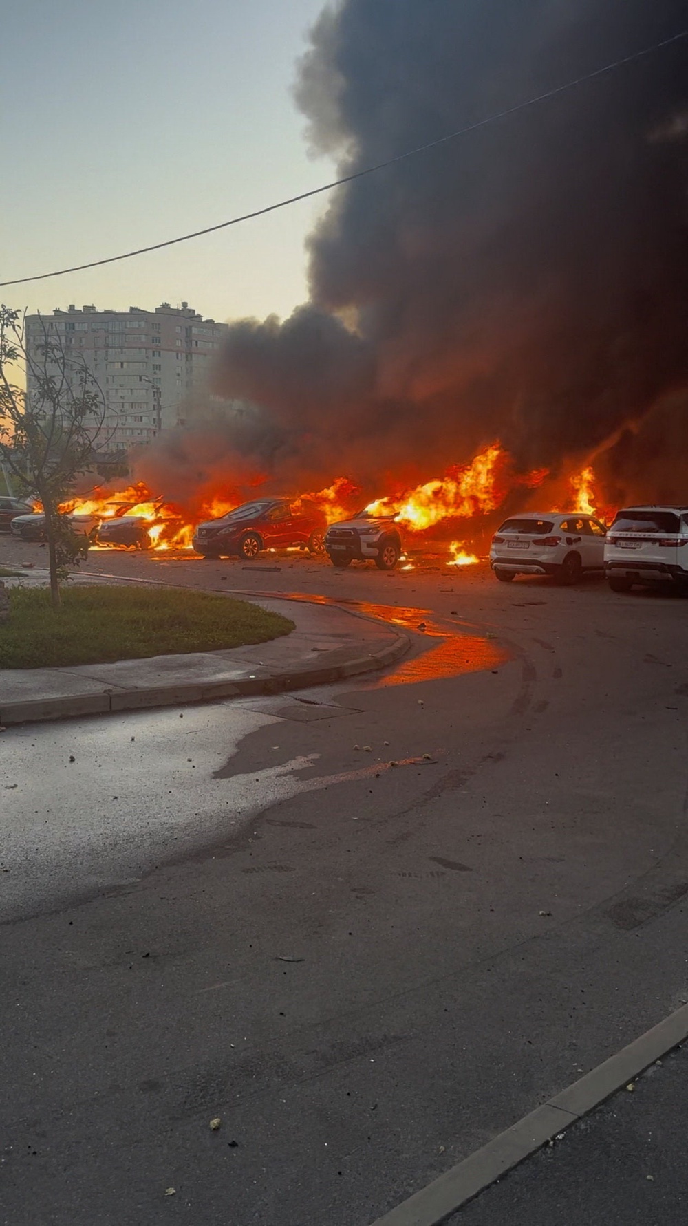 Vehicles burn in the aftermath of a Russian drone strike in the town of Vyshneve in Kyiv region, Ukraine, August 28 (Reuters)