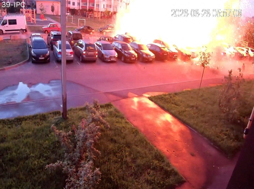 A screen grab from CCTV footage shows flames rising due to a Russian drone strike in the town of Vyshneve (Reuters)
