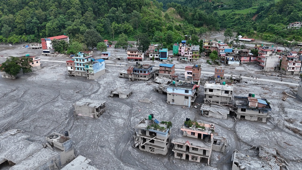 Debris and mud covering settlements following flash floods in Nepal on August 28, 2026 (Getty)