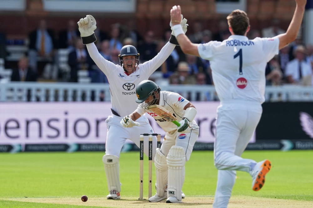 Ollie Robinson took 4-11 from 13 overs in Pakistan’s first innings (AP)