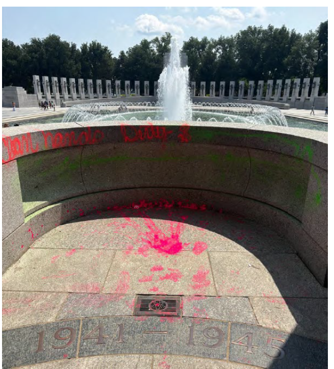 Melissa Farris, of Kentucky, is accused of spray painting the words ‘Clean hands dirty $’ on the landmark and filling a fountain with bubbles on Aug. 13 (DOJ)