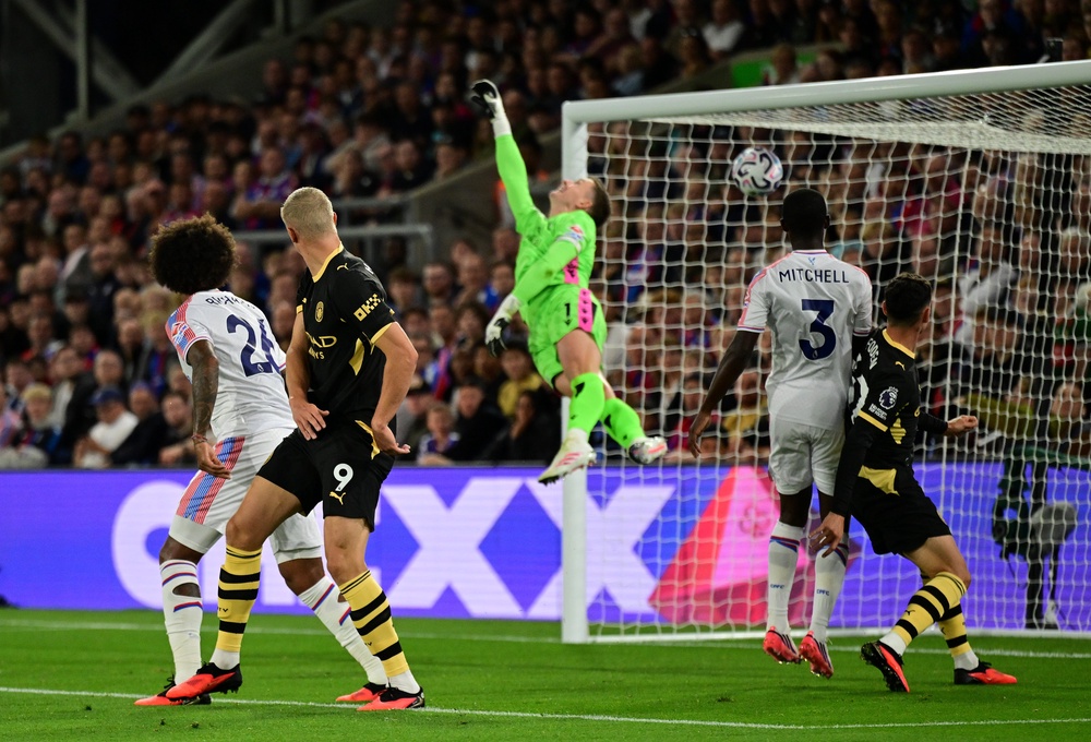 Haaland's header sailed over a helpless Henderson as City opened the scoring (Getty)
