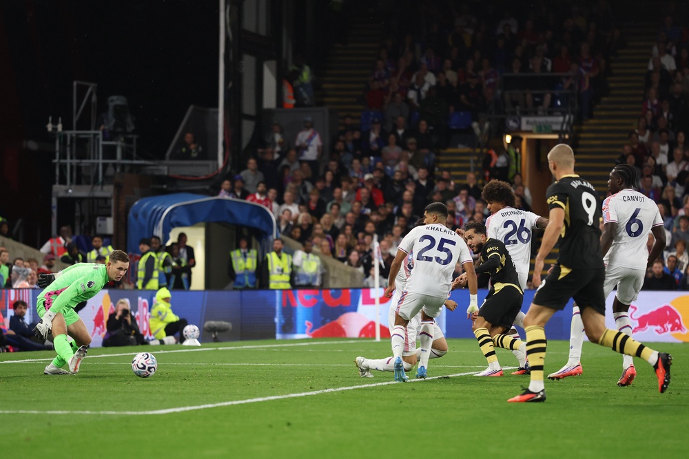 Cherki's first goal was the moment of the night, the Frenchman skipping past two challenges before sliding past Henderson (Getty)