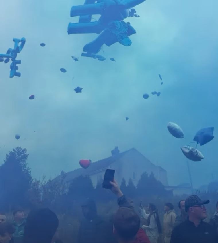 Blue flares and balloons were released for Michael Cahill (Instagram)