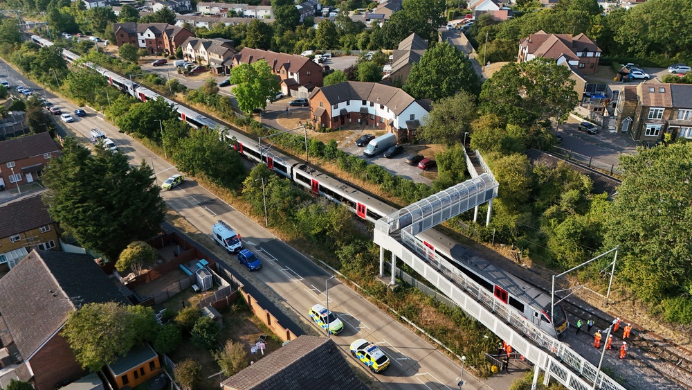 Rail workers, at the scene adjacent to Salcott Crescent, Wickford (Jonathan Brady/PA) (PA Wire)