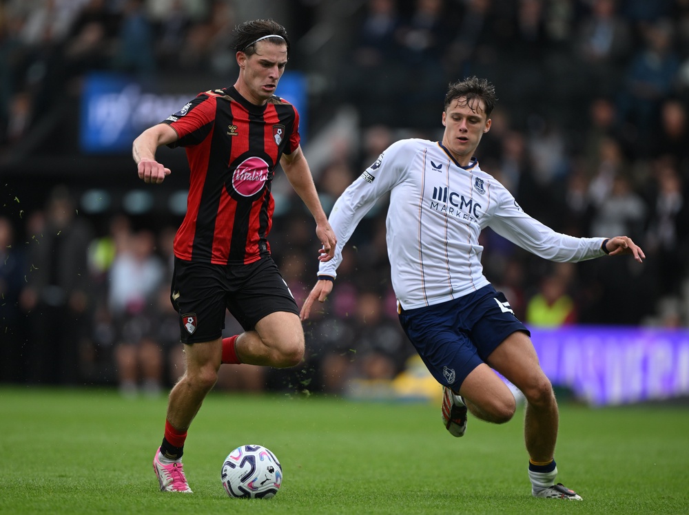 Alex Scott of Bournemouth is challenged by Harrison Armstrong of Everton (Getty)