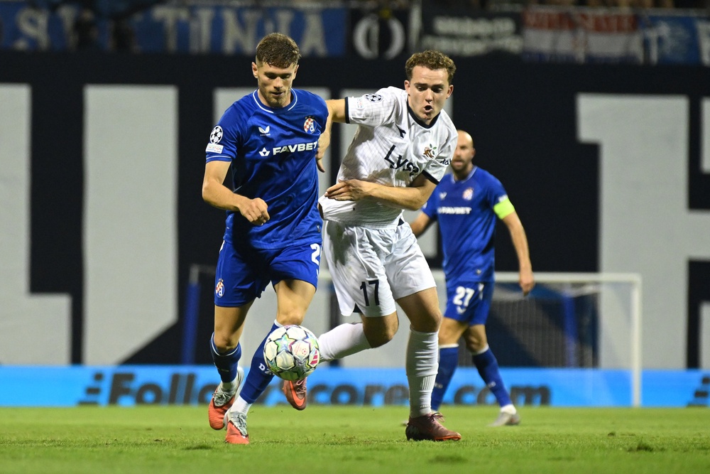 Moris Valincic of GNK Dinamo is challenged by Edwin Austbo of Viking (Getty)