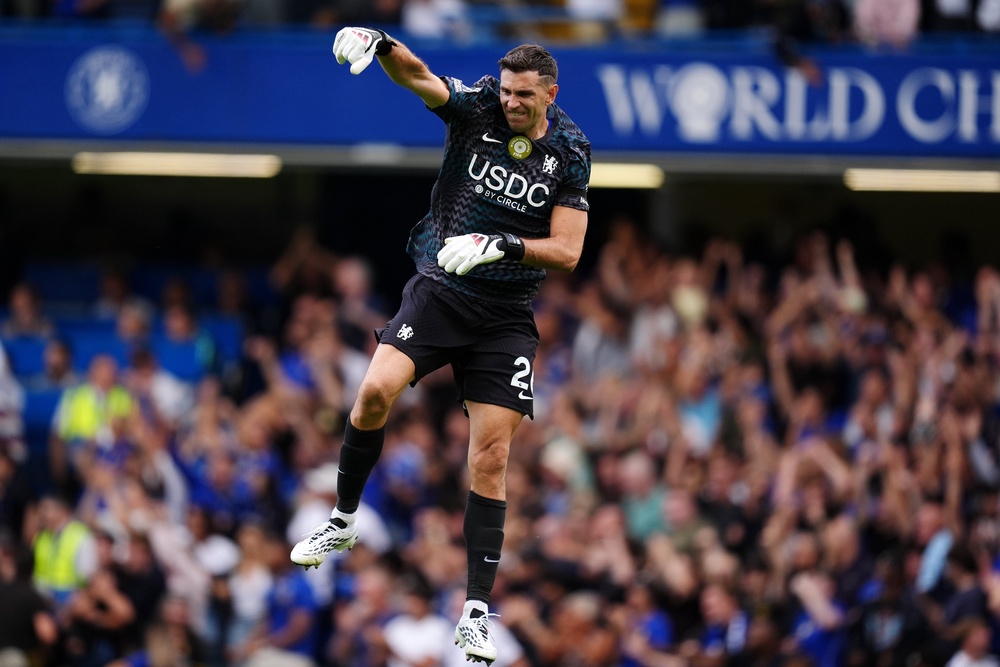 Deubant Emiliano Martinez celebrates Cole Palmer’s goal (PA Wire)