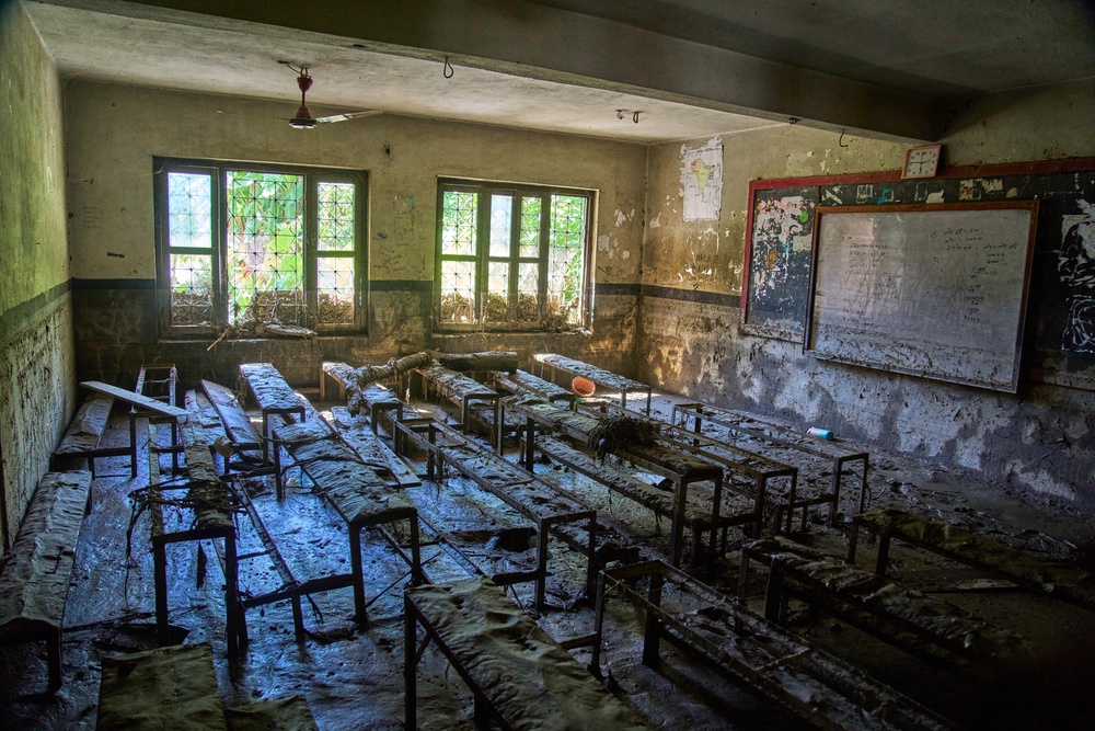Mud covers a classroom at the Shree Bagheswori Madhyamik School, damaged in flash flooding in Galchhi, Dhading district of Nepal, (AP)