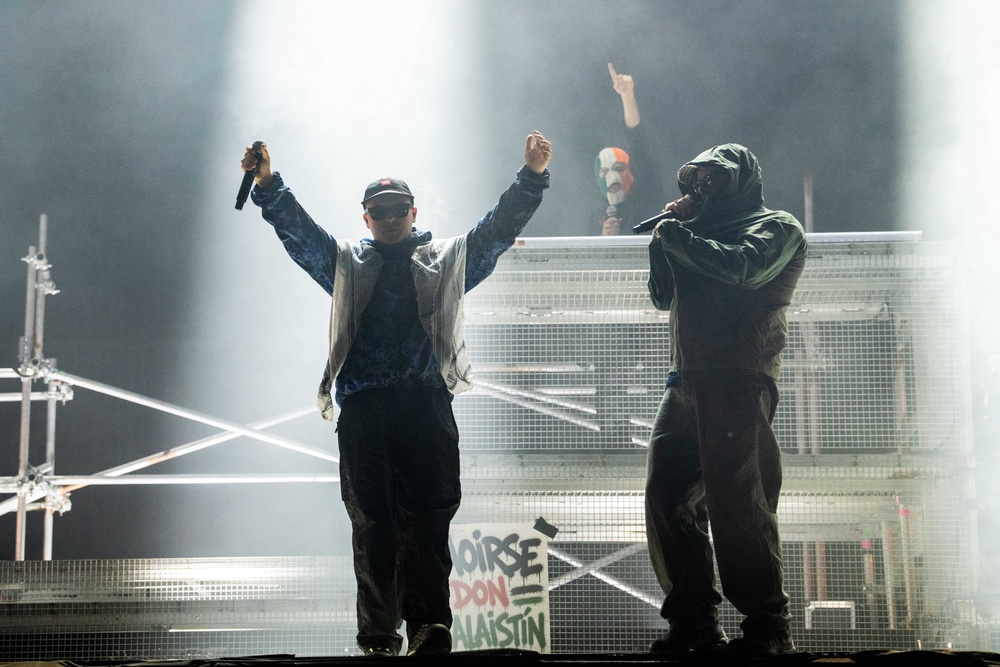 With a Palestinian flag draped over the DJ deck, the trio, consisting of rappers Moglai Bap, Mo Chara and DJ Provai – who has been replaced with an alternative due to the arrival of his newborn child – got the crowd jumping with hits from their latest album FENIAN as well as 2024’s Fine Art, with some political messaging interspersed into their set (PA)