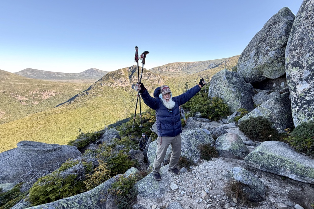 Dale Sanders, 91, celebrates after completing a difficult section of Mt. Katahdin, Monday, Aug. 31, 2026, in Baxter State Park in Piscataquis County, Maine (AP)