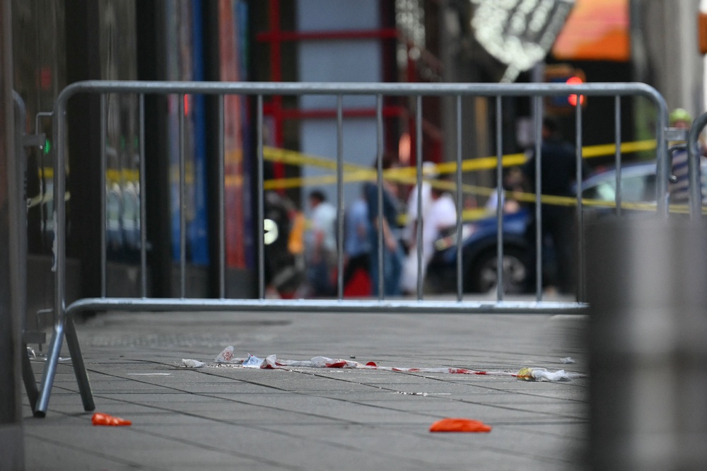Pamela Cisneros, a 49-year-old Queens resident armed with two knives, stabbed a 68-year-old man and a 32-year-old woman just before 4:30 p.m. ET on Monday, according to police (AFP via Getty Images)