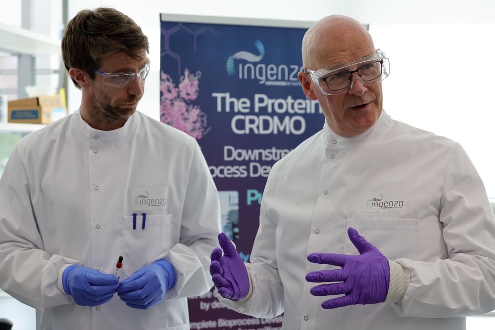 John Swinney (right) spoke about his Programme for Government plans during a visit to Ingenza in Edinburgh. (Steve Welsh/PA)