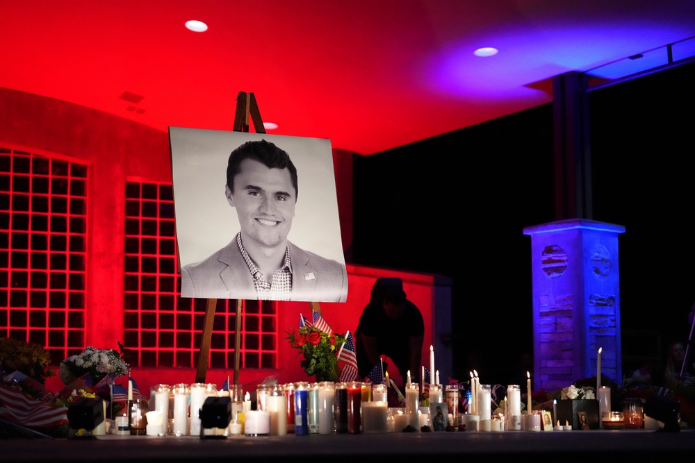 A photo of Charlie Kirk, the CEO and co-founder of Turning Point USA, stands at his vigil on Sept. 11, 2025 (Copyright 2025 The Associated Press. All rights reserved)