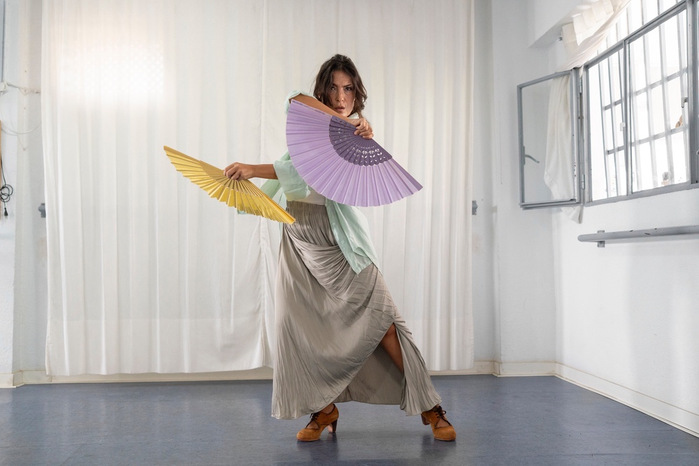 Carmen Torres, a professional flamenco dancer, rehearses a guajira, a flamenco style that traditionally incorporates the use of a fan, in Seville. (Copyright 2026 The Associated Press. All rights reserved.)