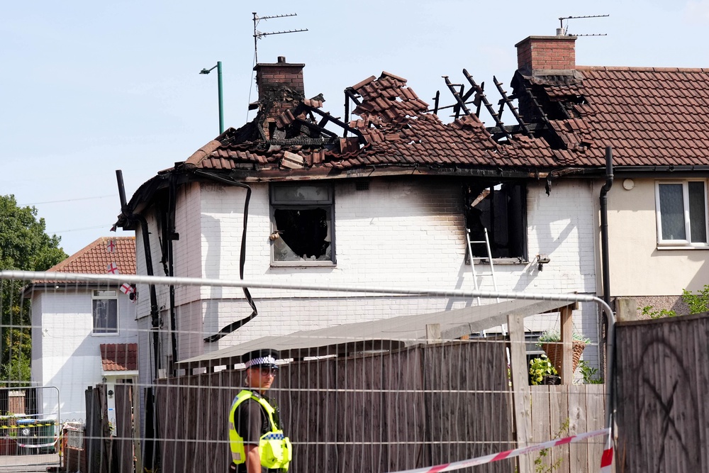 Emergency services at the scene after the house fire on Birchington Avenue, Grangetown (PA)