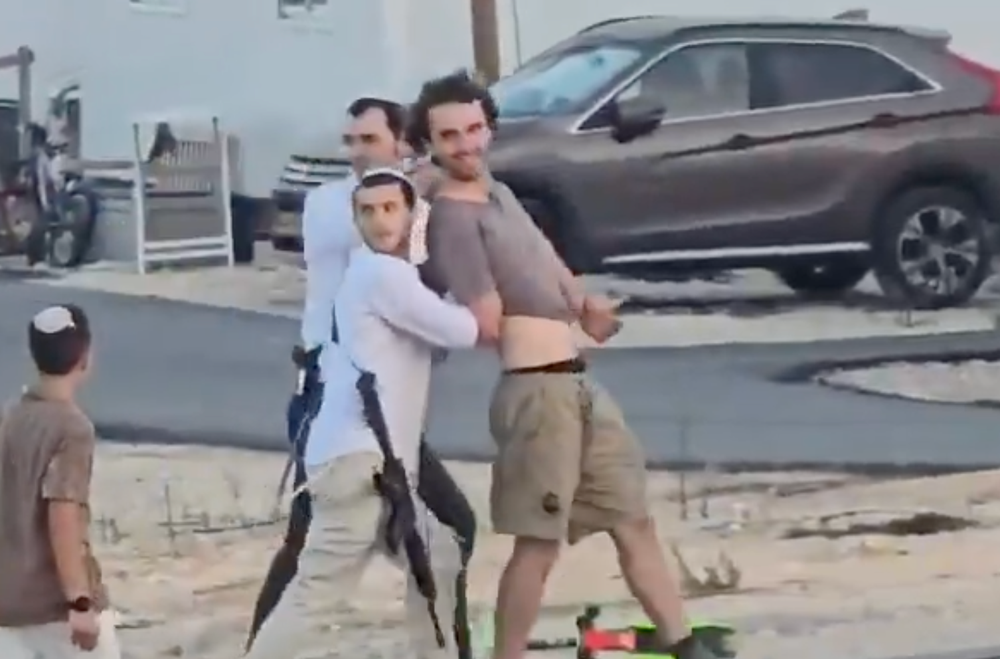 Joughin was marched away by the armed settlers (Social media)