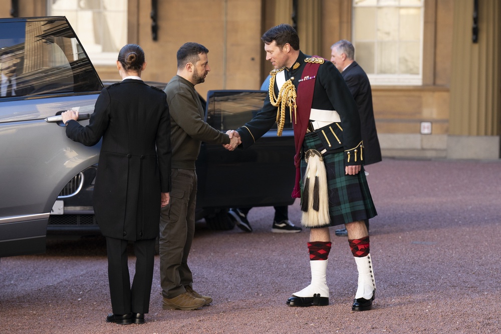 Ukrainian President Volodymyr Zelensky is greeted by Lieutenant Colonel Jonny Thompson, equerry to the King, in February 2023 (Kirsty O’Connor/PA) (PA Archive)