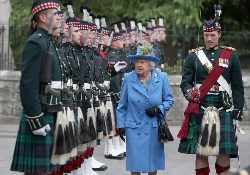 Queen Elizabeth II inspects Balaklava Company, 5 Battalion The Royal Regiment of Scotland commanded by then-Major Johnny Thompson (Andrew Milligan/PA) (PA Archive)